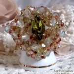 Veronese ring met facetten, draaiende toppen en een Swarovski kristallen shuttle